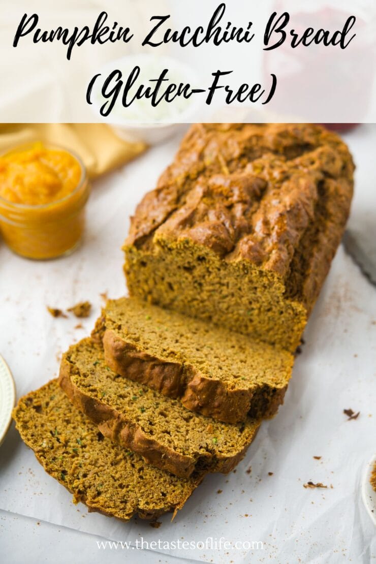 Sliced loaf of pumpkin zucchini bread sits on parchment paper with a bowl of pumpkin puree nearby; text on image reads Pumpkin Zucchini Bread (Gluten-Free) and website www.thetastesoflife.com.