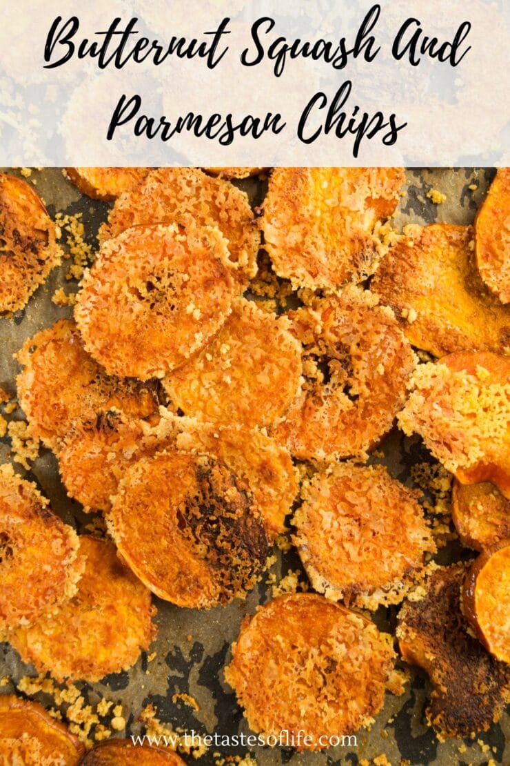 Golden brown butternut squash and parmesan chips scattered on a baking sheet, showing crispy edges and a cheesy coating. The text at the top reads Butternut Squash And Parmesan Chips.