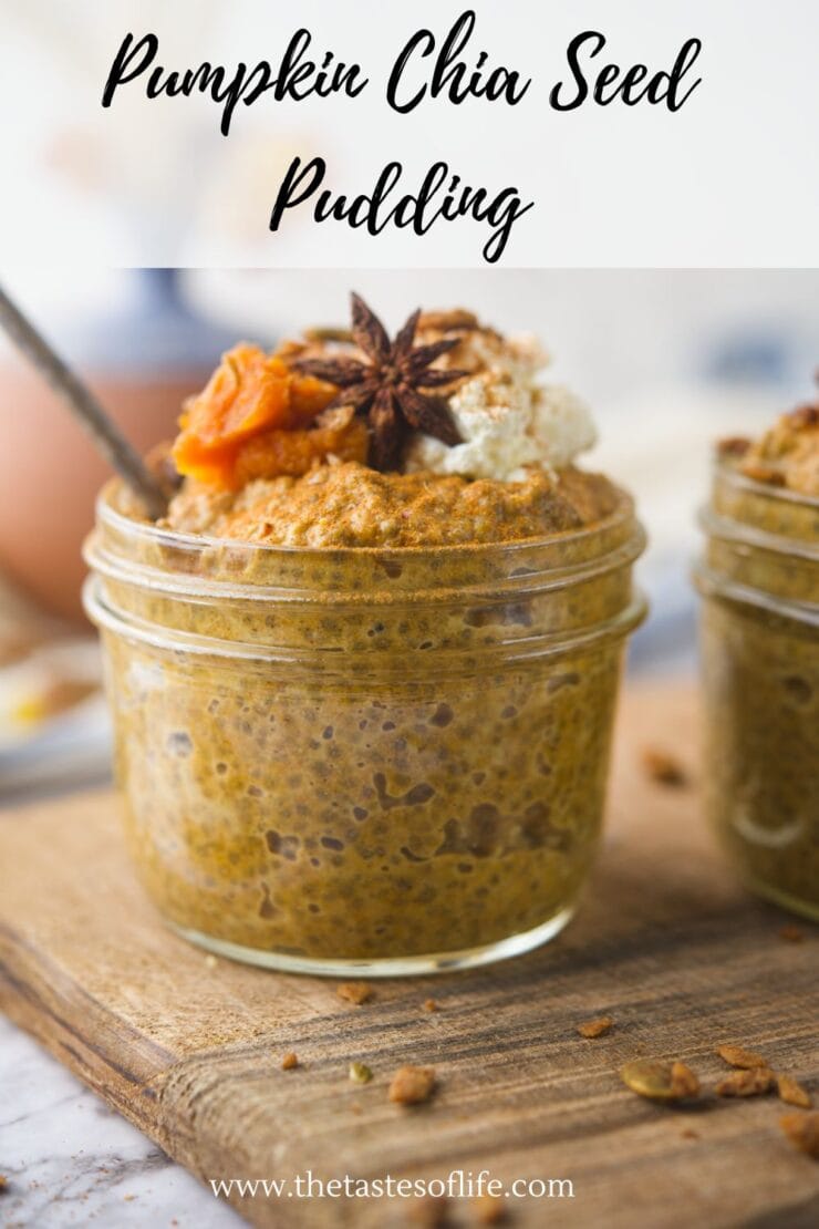 A glass jar filled with pumpkin chia seed pudding, topped with whipped cream, a star anise, and pumpkin puree, sitting on a wooden board. Text above reads Pumpkin Chia Seed Pudding.