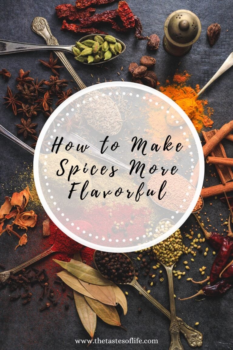 A variety of colorful spices in bowls and scattered on a dark surface surround a circle with the text “How to Make Spices More Flavorful.” Spoons, herbs, and a pepper mill complete the vibrant food scene.