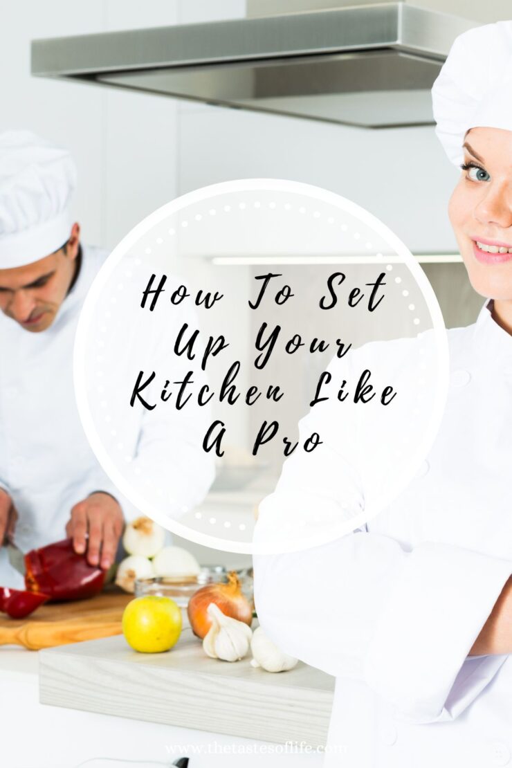 Two chefs in white uniforms and hats work in a bright kitchen. One smiles at the camera while the other chops vegetables. Text overlay reads, “How To Set Up Your Kitchen Like A Pro.”.