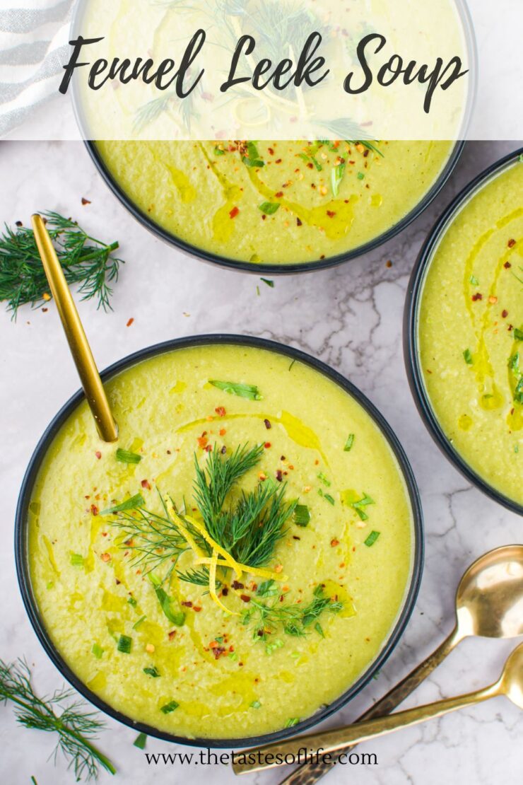 Three bowls of creamy fennel leek soup garnished with fresh dill, chives, lemon zest, and chili flakes, with a gold spoon in one bowl, set on a white marble surface. Text overlay reads &ldquo;Fennel Leek Soup.&rdquo;.
