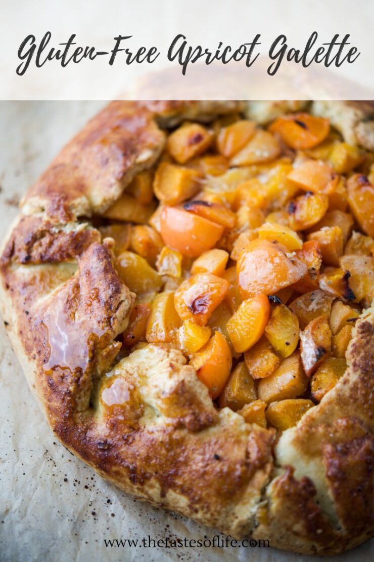 A close-up of a rustic gluten-free apricot galette with golden, flaky crust and juicy apricot filling, displayed on parchment paper. The image has text reading Gluten-Free Apricot Galette.