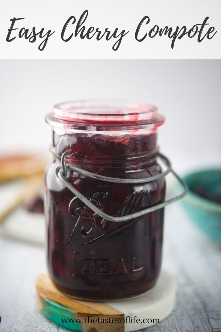 A glass mason jar filled with dark cherry compote sits on a white surface, with the text Easy Cherry Compote above and www.thetastesoflife.com at the bottom.