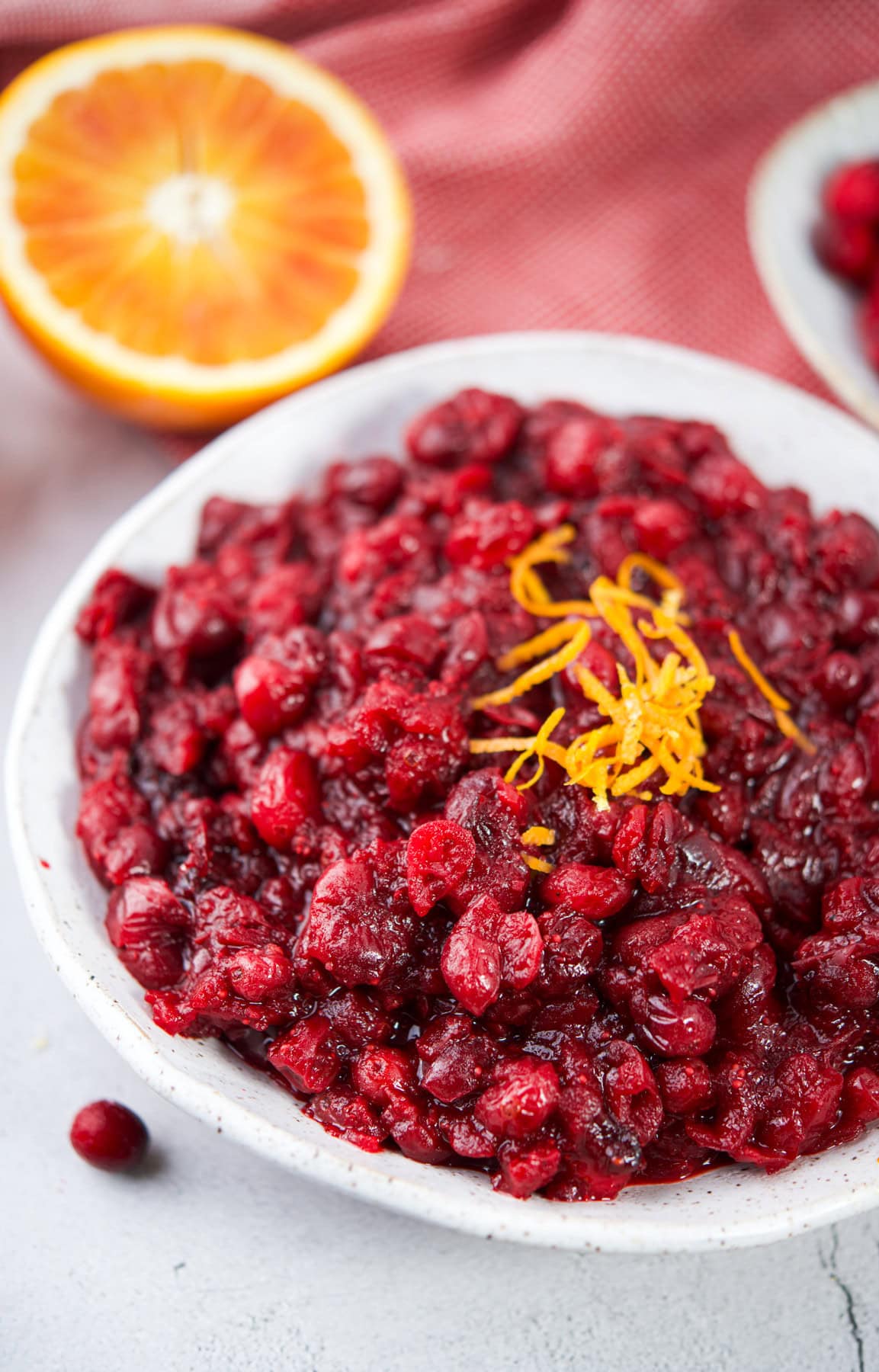 Fresh cranberry orange sauce with lemon zest, vibrant and flavorful, perfect for healthy holiday dishes.