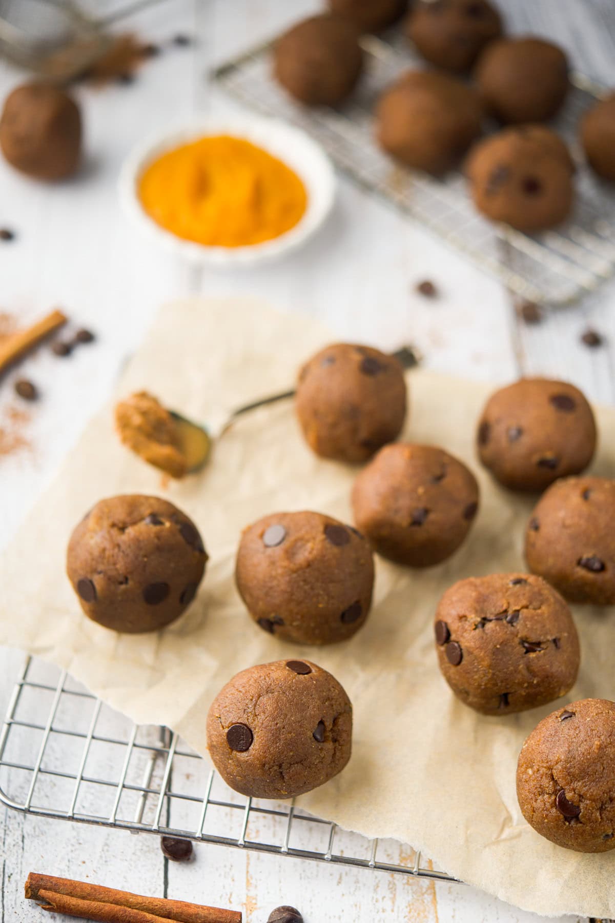 No-Bake High-Protein Pumpkin Balls on Parchment Paper