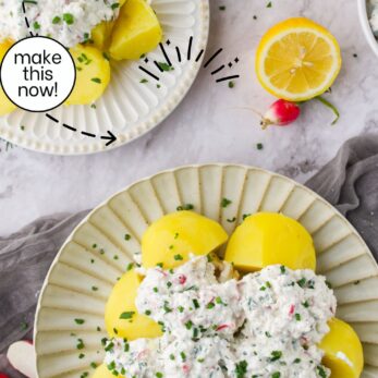 Boiled potatoes topped with creamy farmers cheese dip, chopped chives, and radish slices.