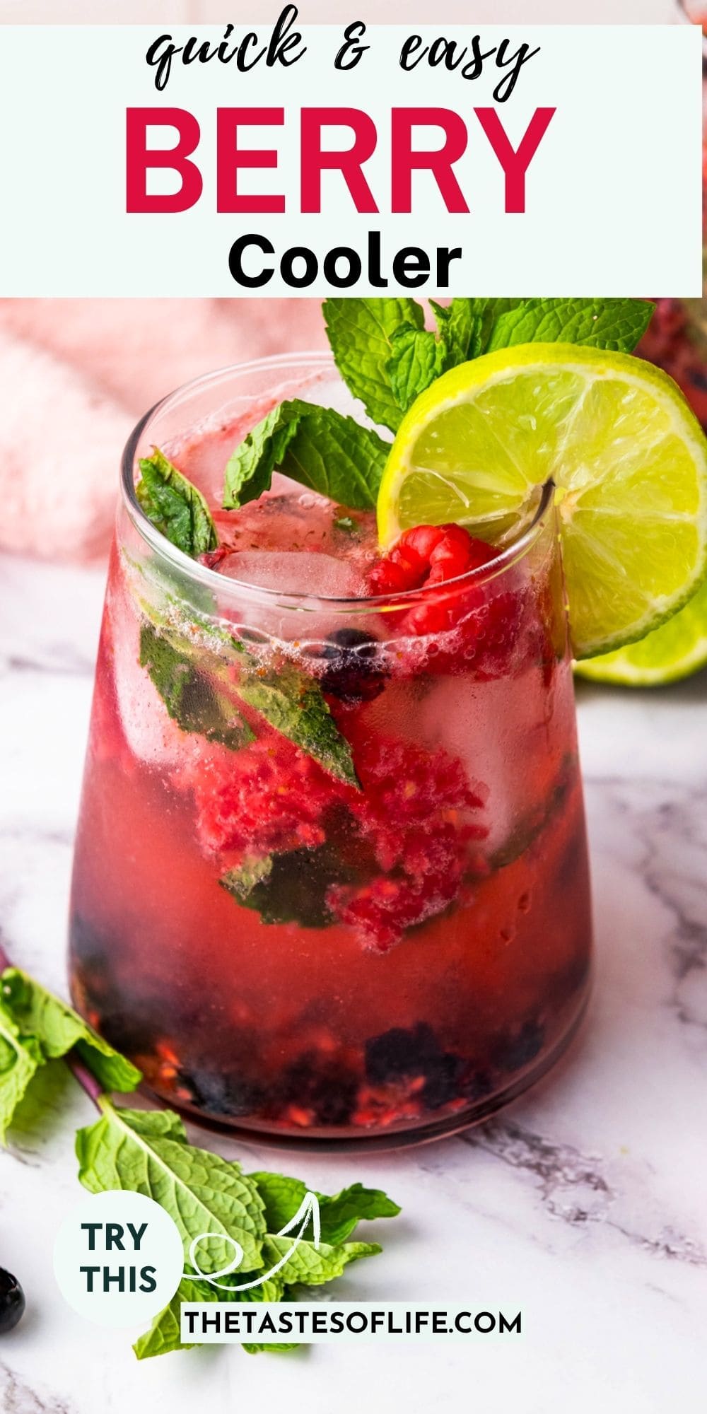 A glass of berry cooler with ice, fresh berries, mint leaves, and a lime slice garnish. Text reads quick & easy BERRY Cooler. Marble surface and more berries and mint are visible in the background.